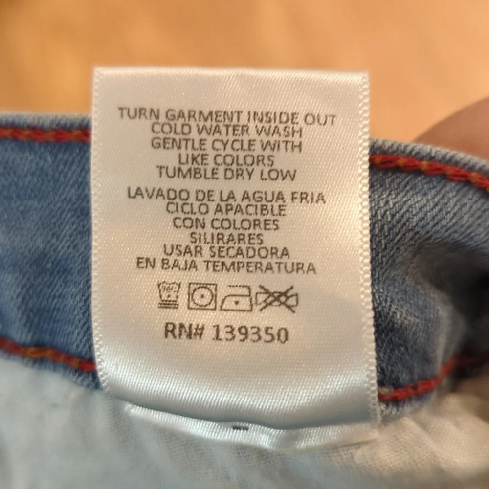 Light wash distressed skinny ankle jeans w/ stretch & raw hem, Angry Rabbit 28" - Picture 7 of 7